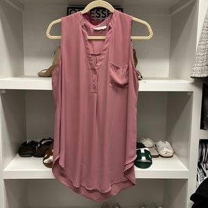 Lush sleeveless blouse tunic. Perfect for under a second layer for the office!